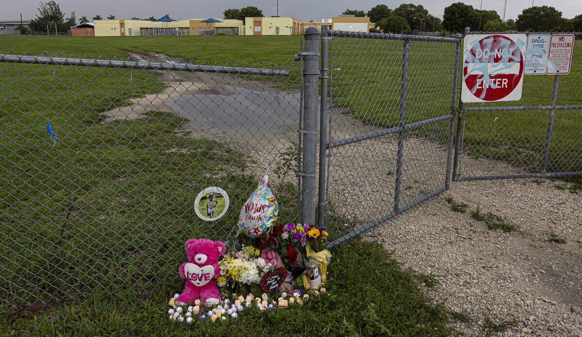 A view of a makeshift memorial for the late Doreen Richards Broadbelt, 71, who police said was walking to her job at Walmart when a dog attacked and fatally mauled her near her home on Labor Day. A vigil was held nearby at Broadbelt’s home on Tuesday, Sept. 9, 2025, in Miami Gardens, Fla.