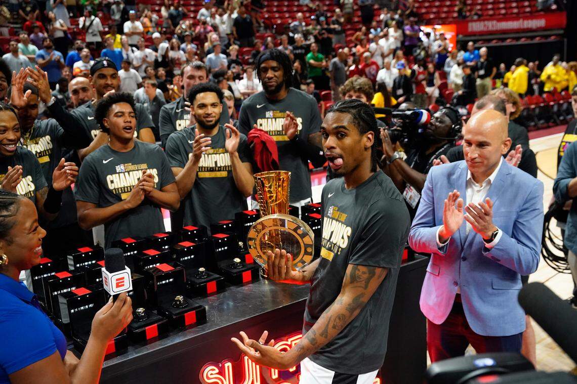 Miami Heat guard Josh Christopher (53) celebrates with the NBA 2K23 Summer League MVP trophy after defeating the Memphis Grizzlies in overtime at Thomas & Mack Center.