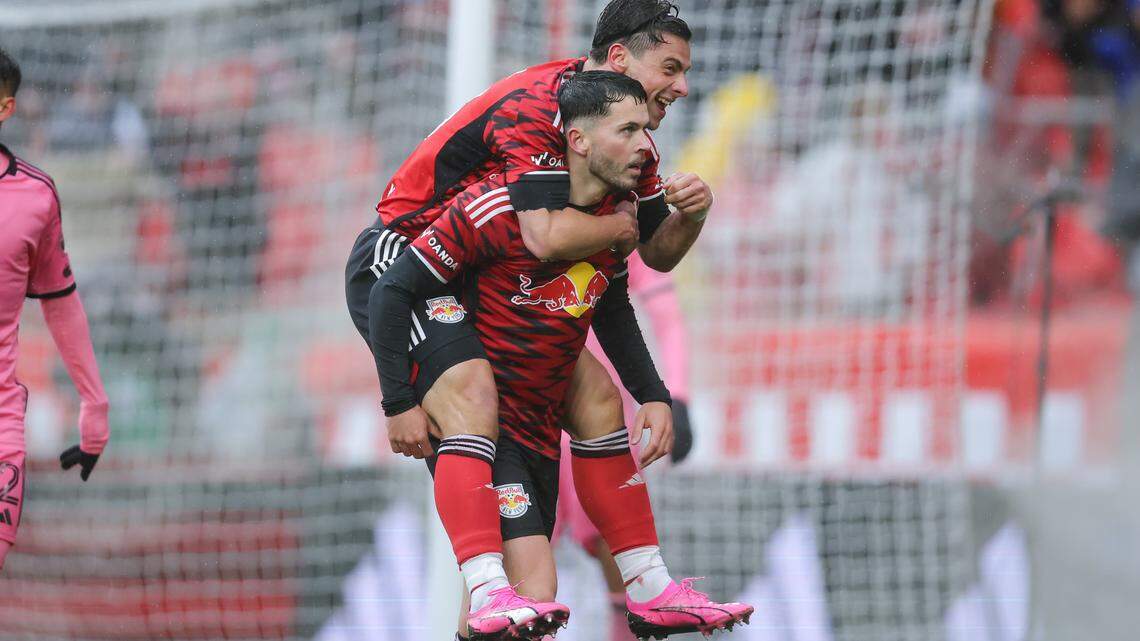 Mar 23, 2024; Harrison, New Jersey, USA; New York Red Bulls midfielder Lewis Morgan (9) celebrates his goal with forward Dante Vanzeir (13) in the second half against Inter Miami CF at Red Bull Arena. Mandatory Credit: Brad Penner-USA TODAY Sports