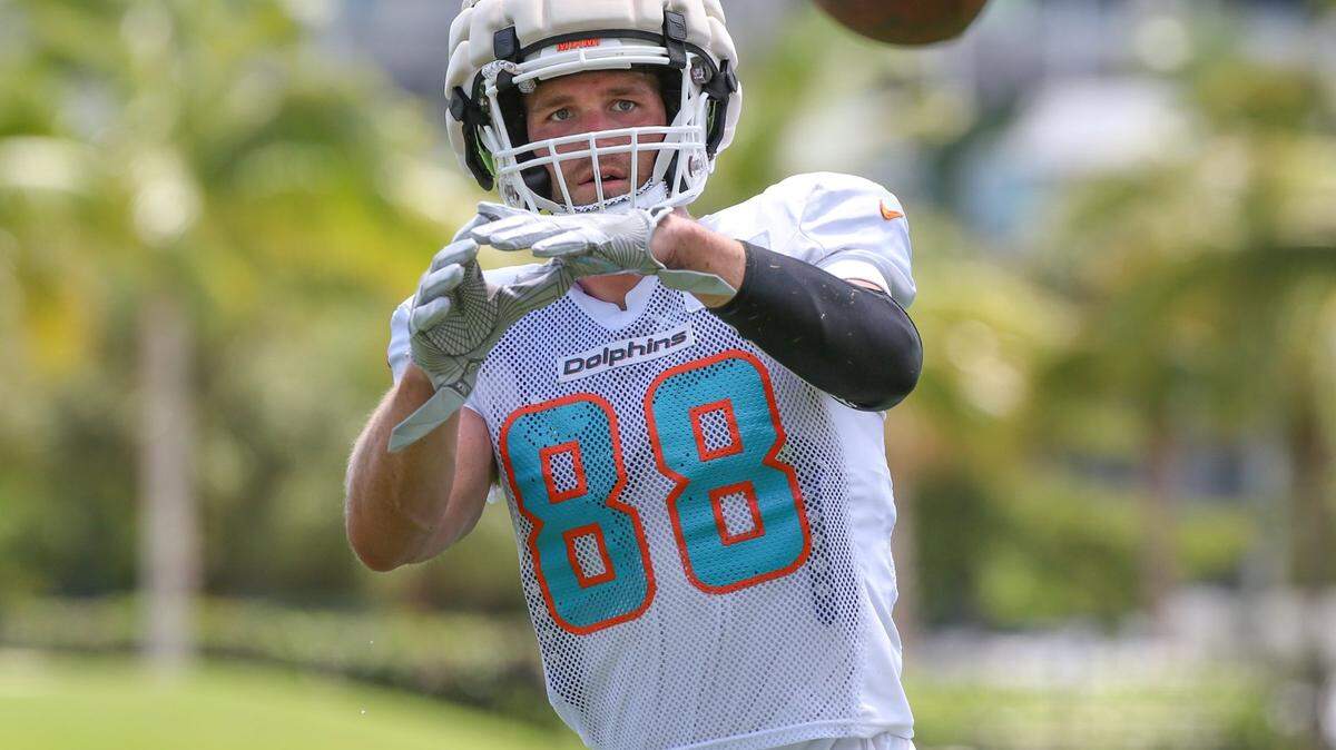 Miami Dolphins tight end Mike Gesicki (88) catches a pass during practice drills at Baptist Health Training Complex in Miami Gardens on Wednesday, August 17, 2022.