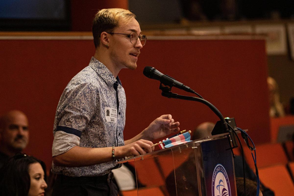 Prism President Maxx Fenning speaks against a measure to allow only the American and Florida flags in schools during the Miami-Dade County School Board meeting at the Miami-Dade County School Board Administration Building in Miami, Florida, on Wednesday, Dec. 14, 2022.