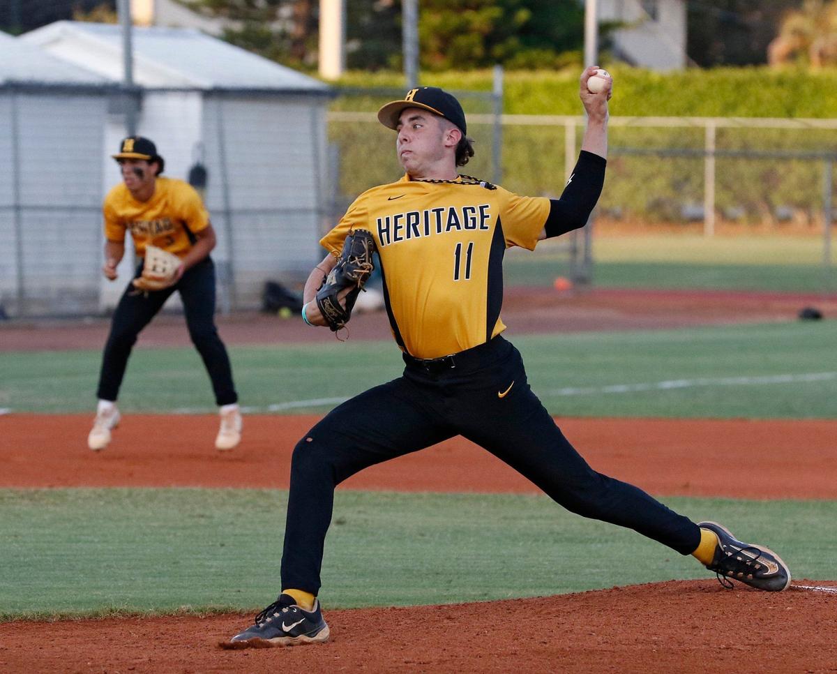 American Heritage Patriots pitcher Spencer Krasner (11) delivers during regional semifinal baseball game against Mater Academy Lions on Friday, May 10, 2024 at American Heritage HS in Plantation. Andrew Uloza / for Miami Herald