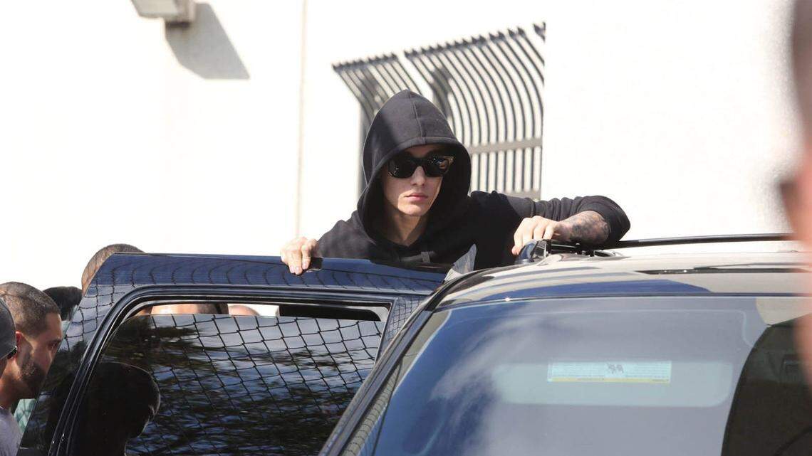 Singer Justin Bieber leaves the Turner Guiford Knight jail after bonding out on his DUI arrest on Jan. 23, 2014.