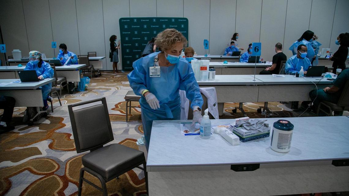 A nurse prepares to start vaccinations at the Hilton Dadeland Hotel next to Baptist Hospital in Miami-Dade on Wednesday, Dec. 16, 2020. Baptist Health began administering the first COVID-19 vaccines for their eligible front-line healthcare workers. On New Year’s Day, Baptist’s foundation offered vaccines to its donors before offering them to the public.