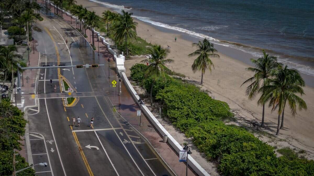 Sea level rise signs as king tides swamp coastal roads | Miami Herald
