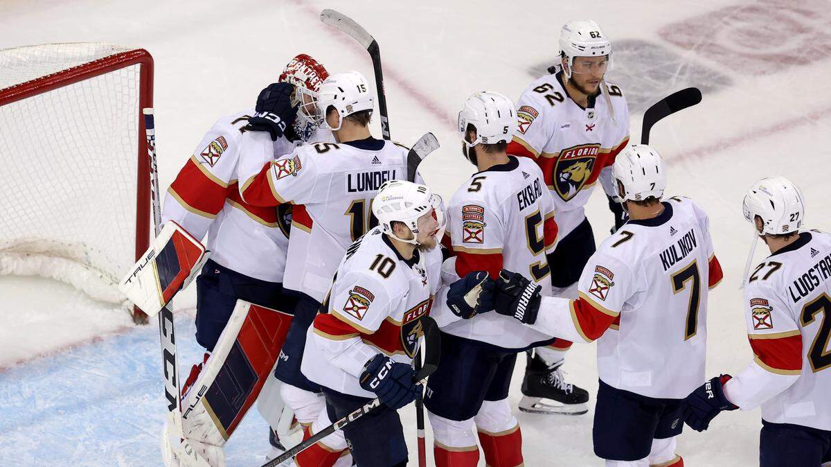 May 30, 2024; New York, New York, USA; Florida Panthers goaltender Sergei Bobrovsky (72) and center Anton Lundell (15) celebrate with teammates after defeating the New York Rangers in game five of the Eastern Conference Final of the 2024 Stanley Cup Playoffs at Madison Square Garden. Mandatory Credit: Brad Penner-USA TODAY Sports