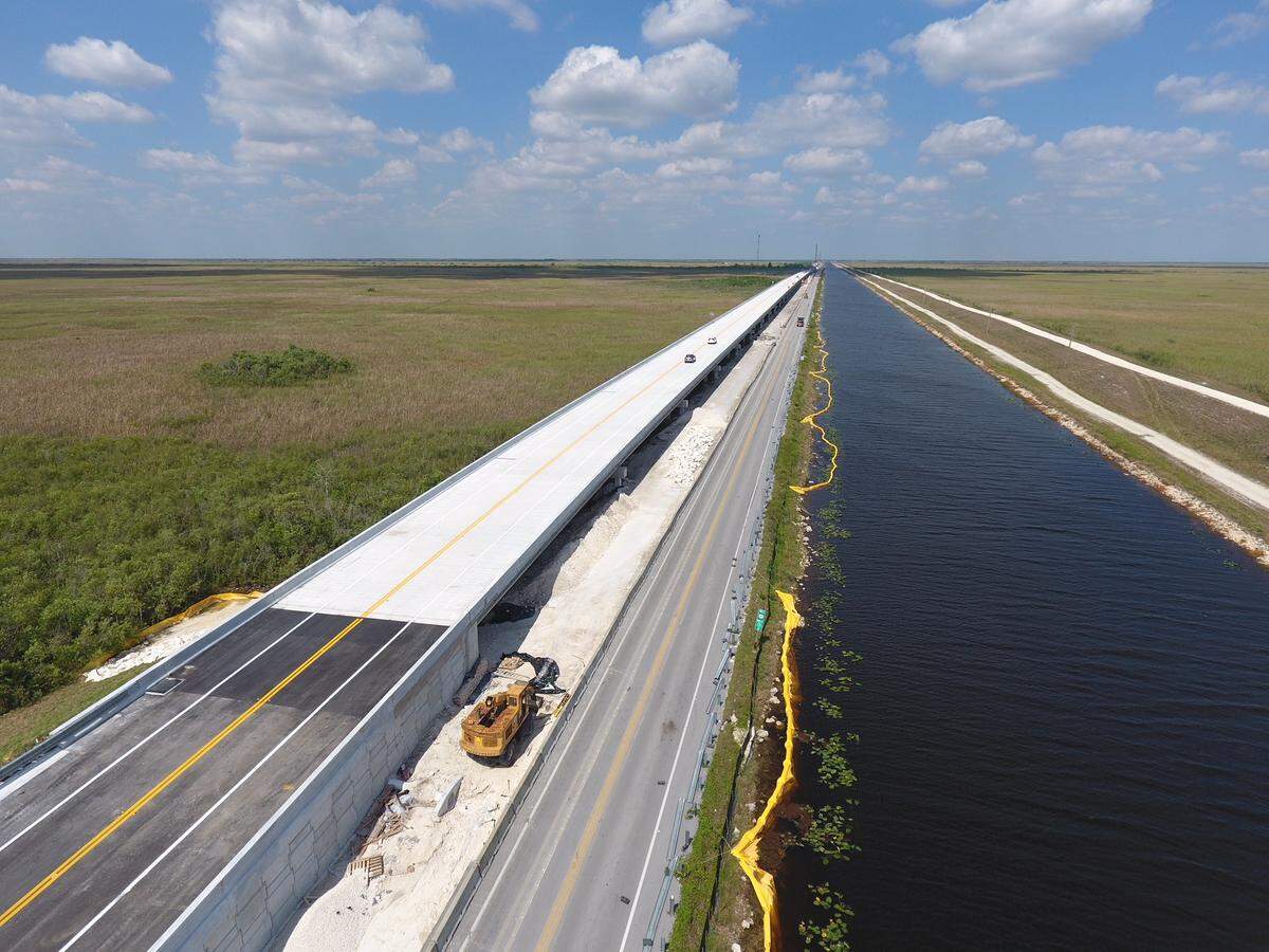 A 2.6-mile bridge along the Tamiami Trail is expected to be finished next year, adding to a one-mile bridge completed in 2013. The two bridges will allow water managers to raise water next to the aging road to 8.5 feet and increase the amount of water moved into Shark River Slough and Taylor Slough to revive ailing marshes. Photo courtesy Everglades National Park