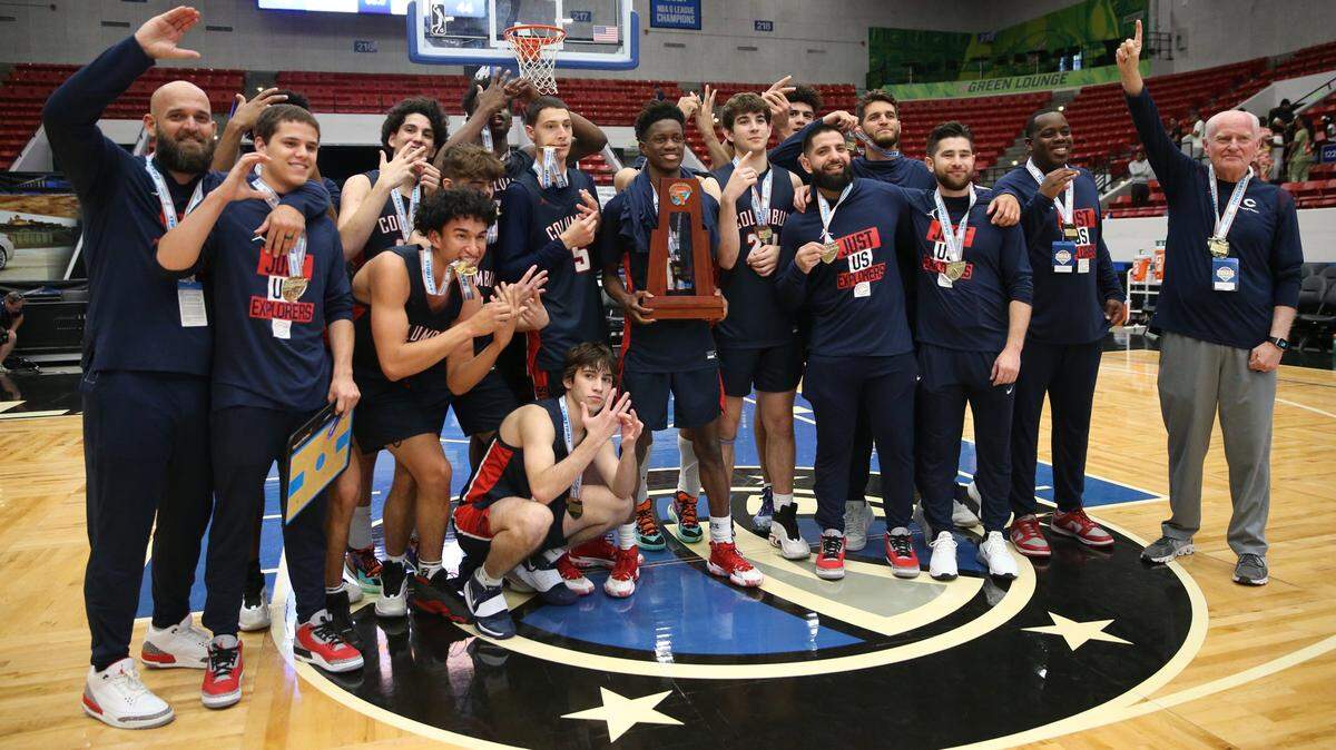 Columbus team celebrates after defeating Dr. Phillips 45-44 in the Florida High School Athletic Association Class 7A boys basketball state championship at the RP Funding Center in Lakeland on Saturday, March 5, 2022.