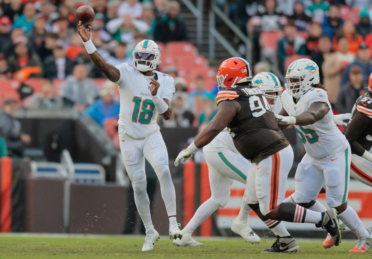 Miami Dolphins quarterback Tyler Huntley (18) sets up toa pass against the Cleveland Browns during the first half of an NFL Football game at Huntington Bank Field in Cleveland, Ohio on Sunday, December 29, 2024.