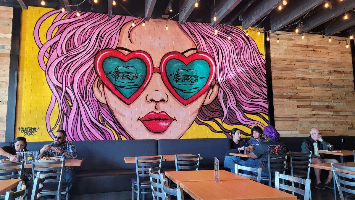 A colorful mural on the wall of the Pincho restaurant in Pembroke Pines.