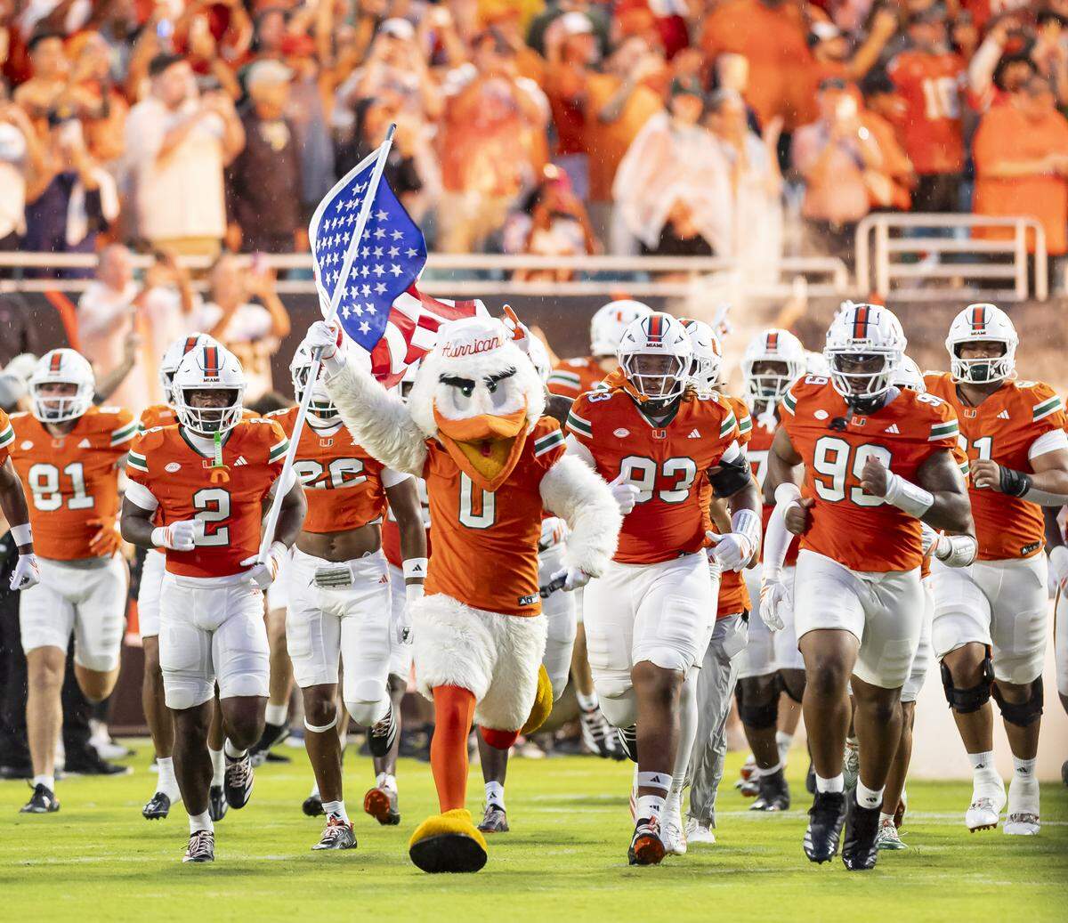 Miami Hurricane’s Sebastian the Ibis leads the team on the field before they play against the Notre Dame Fighting Irish in their NCAA football game at Hard Rock Stadium on Sunday, Aug. 31, 2025, in Miami Gardens, Fla.