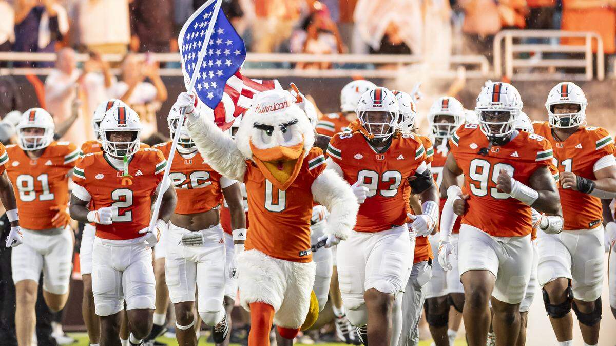 Miami Hurricane’s Sebastian the Ibis leads the team on the field before they play against the Notre Dame Fighting Irish in their NCAA football game at Hard Rock Stadium on Sunday, Aug. 31, 2025, in Miami Gardens, Fla.