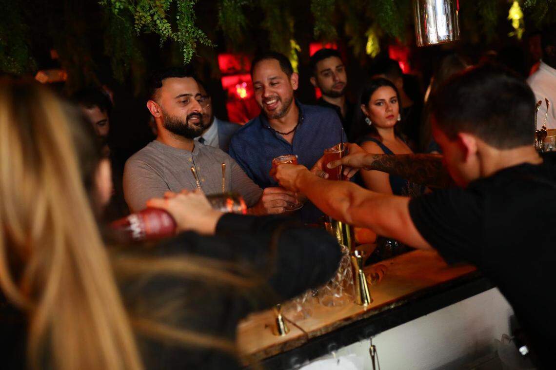 Cocktail fans gather at the grand opening of Spellbound.