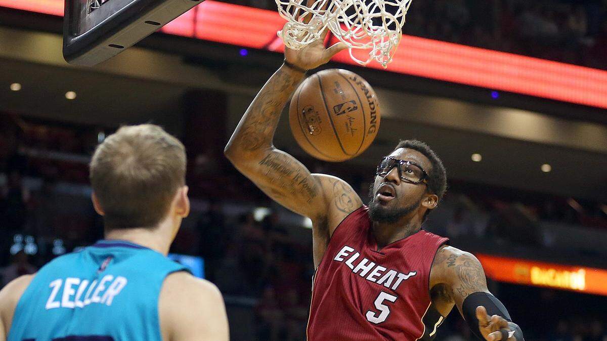 Amar’e Stoudemire, of the Miami Heat, dunks against Cody Zeller, of the Charlotte Hornets, in the first quarter of a game at  AmericanAirlines Arena in Miami in 2016.