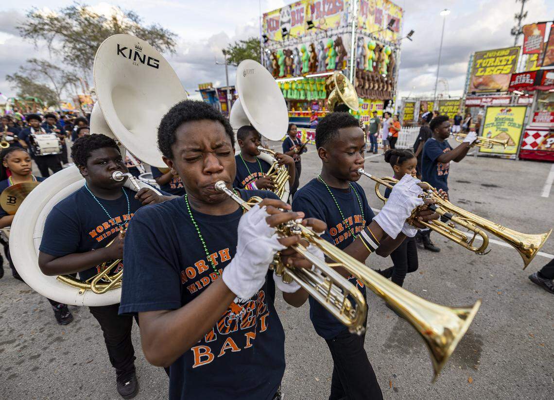 The North Miami Middle School Marching Tigers Band performs during a parade on the opening day of the 74th annual Miami-Dade County Youth Fair on Thursday, March 12, 2026, in Miami, Fla.