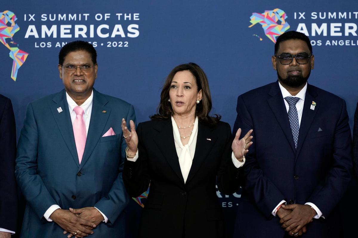 Flanked by President Chan Santokhi of Suriname, left, and President Dr. Irfaan Ali of Guyana, Vice President Kamala Harris answers questions from the media at the Summit of the Americas in Los Angeles on Thursday, June 9, 2022.