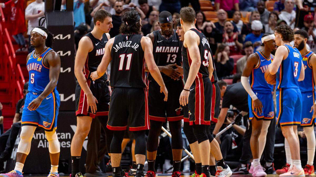 Miami Heat players Bam Adebayo (13), Jaime Jaquez Jr.(11), Nikola Jovic (5), Duncan Robinson (55), Tyler Herro (14), huddle on the court during the second half of an NBA game against the Oklahoma City Thunder at Kaseya Center in Miami on January 10, 2024.