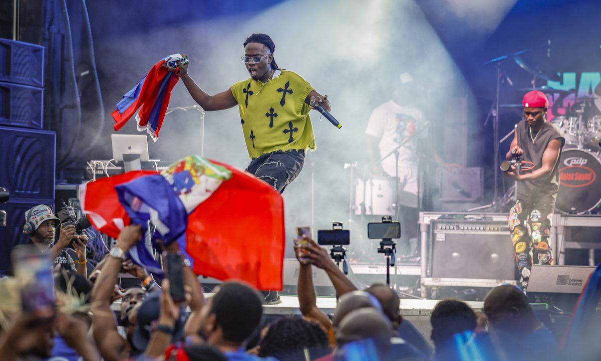 Haitian singer AndyBeatZ performs on stage during the 28th Annual Haitian Compas Festival at The NoMI Village celebrating Haitian Flag Day, in North Miami, Florida  on Saturday, May 16, 2026.