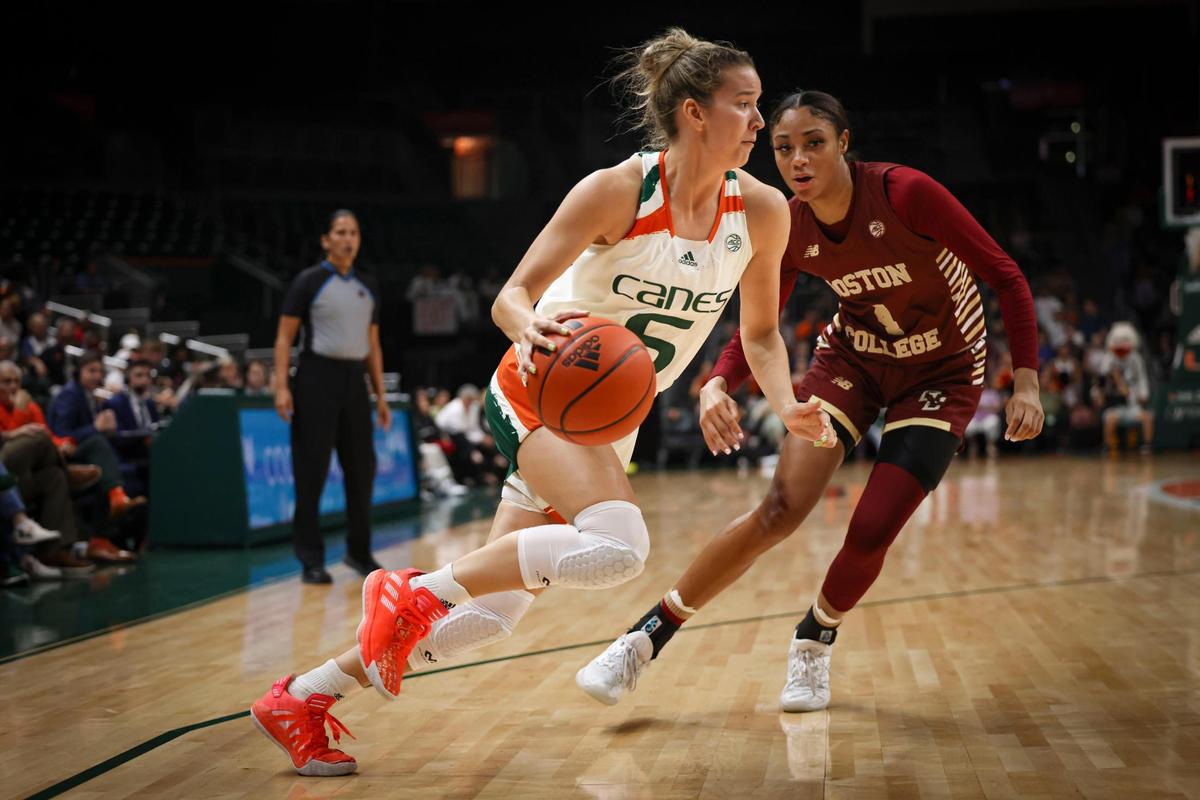 Hurricane’s Karla Erjavec (5) drives passed Boston’s Jojo Lacey (4) during the second quarter of a NCAA women’s basketball game between the University of Miami Hurricanes and Boston College on Thursday, Jan. 26, 2023, in Coral Gables. The score at half time was 41-37 with Boston ahead.