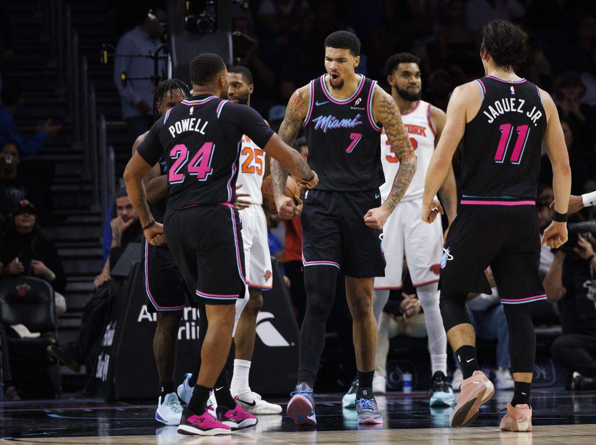 Miami Heat center Kel'el Ware (7) reacts to scoring during the second half of a game against the New York Knicks on Monday, Nov. 17, 2025, at the Kaseya Center in downtown Miami, Fla.