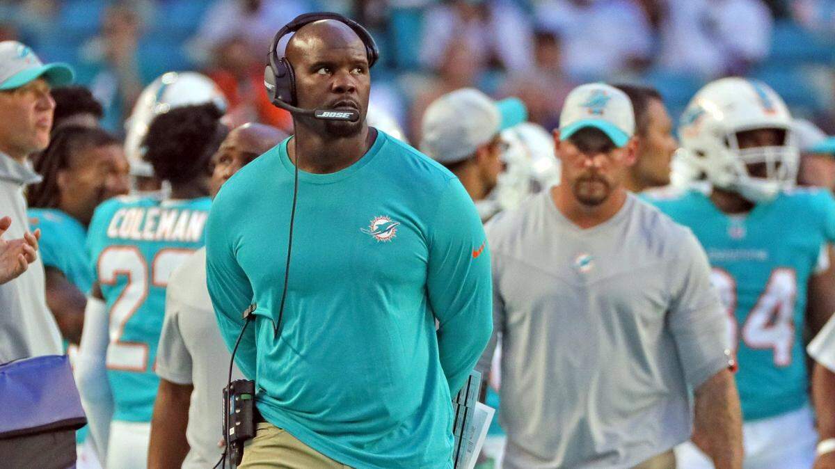 Miami Dolphins head coach Brian Flores watches from the sidelines against the Atlanta Falcons at Hard Rock Stadium in Miami Gardens on Saturday, August 21, 2021.