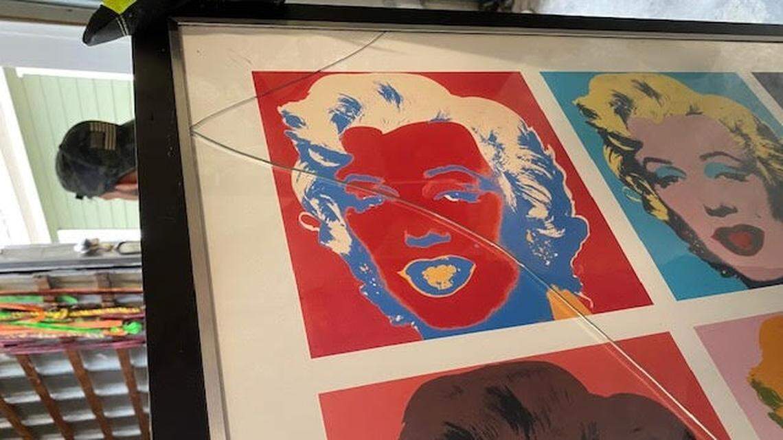 The Rosenfields say the glass on this artwork was cracked during the move.