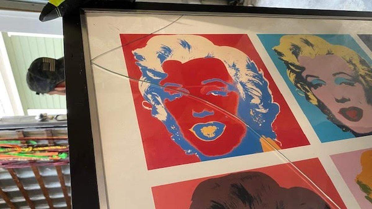 The Rosenfields say the glass on this artwork was cracked during the move.