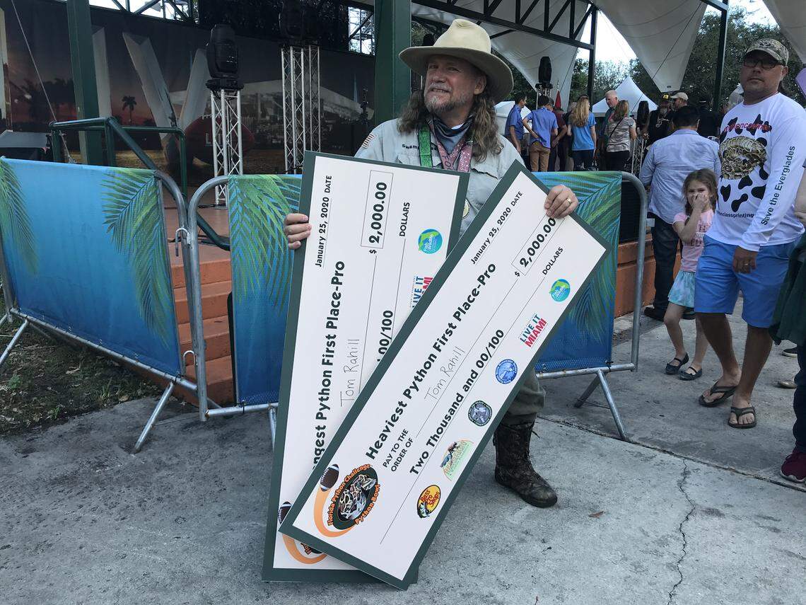 Tom Rahill, founder of the Swamp Apes, an organization that takes veterans to hunt pythons in the Everglades, won prizes for the longest and the heaviest snakes caught in the 2020 Python Bowl.
