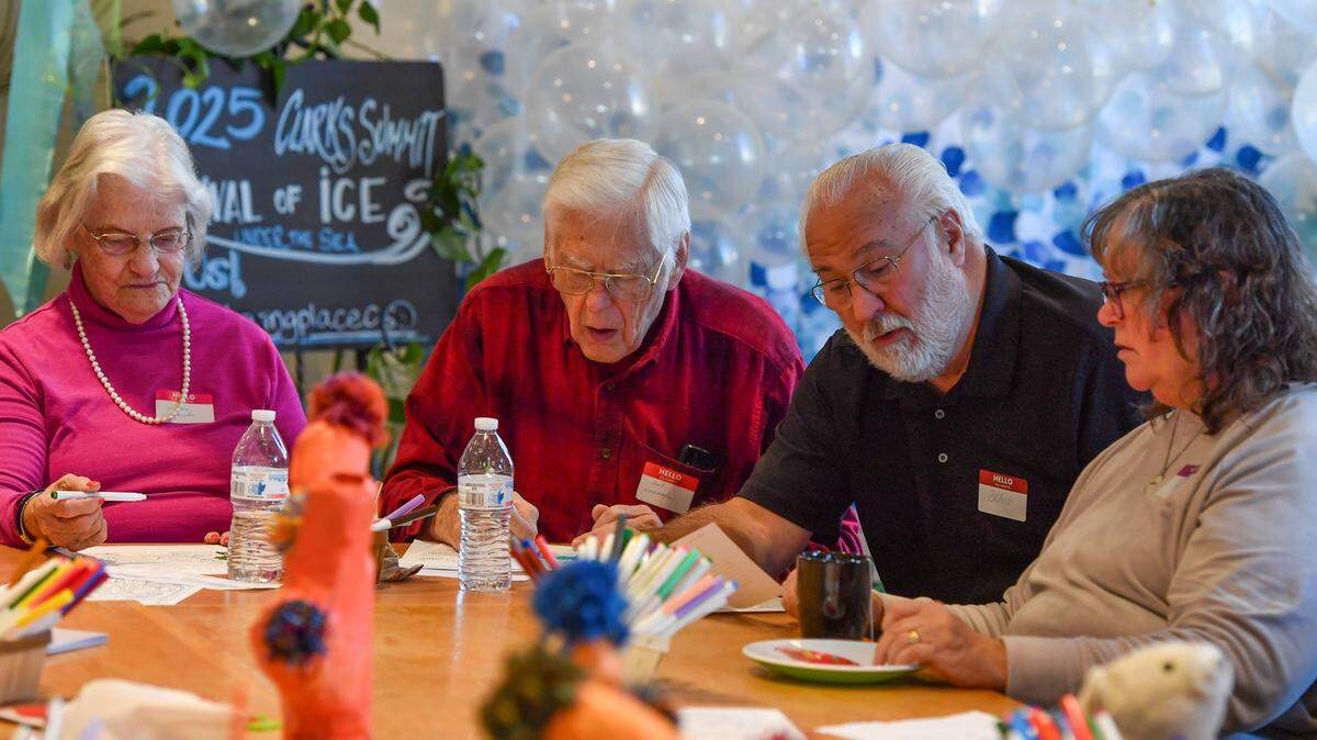 At The Gathering Place, people with memory loss and their caregivers participate in regular activities including trivia and crafts that can help reduce isolation and stress.