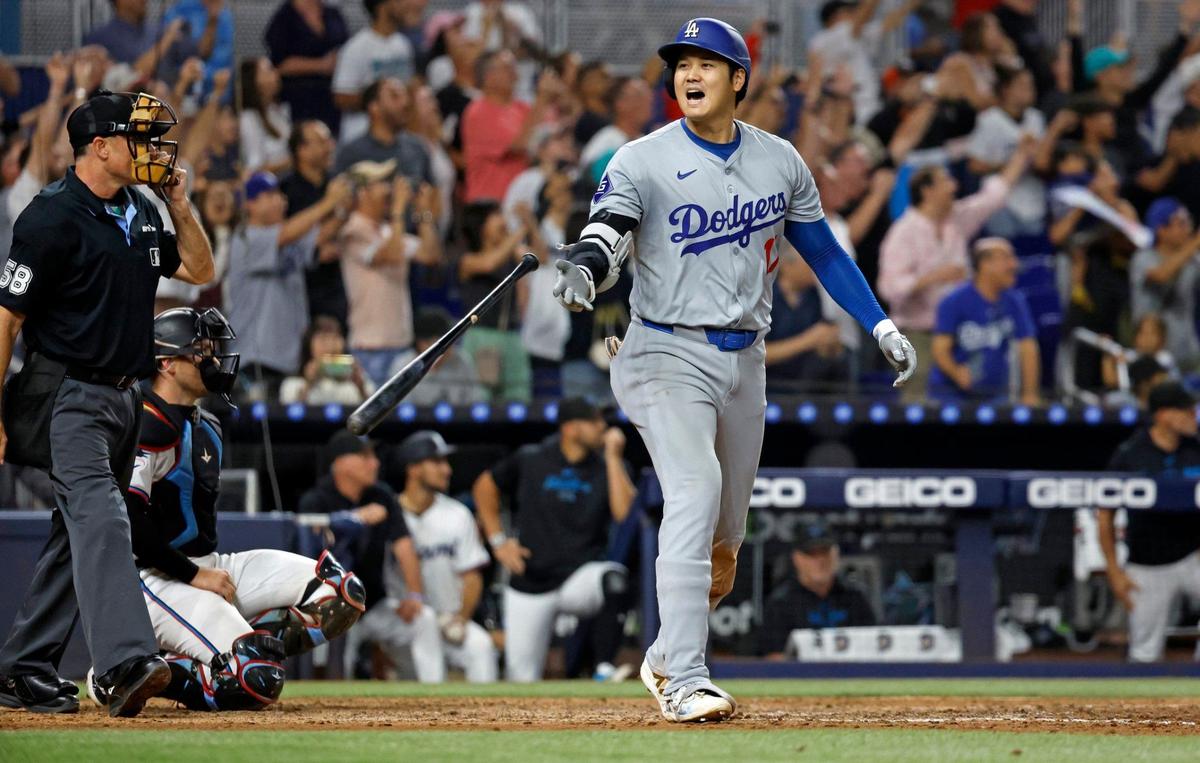 Los Angeles Dodgers Shohei Ohtani (17) reacts after hitting his 50th home run on a fly ball to left field against the Miami Marlins in the 7th inning during an MLB game at loanDepot Park in Miami Thursday, September 19, 2024.