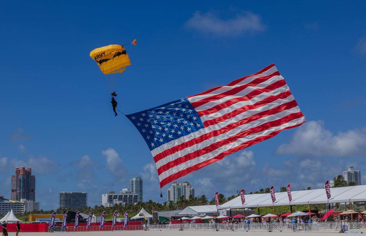 A member of the U.S. Army Golden Knights gets ready to land in South Beach during the Hyundai Air & Sea Show annual National returns Salute to America's Heroes for Memorial Day Weekend celebration, in Miami Beach, on Saturday, May 23, 2026