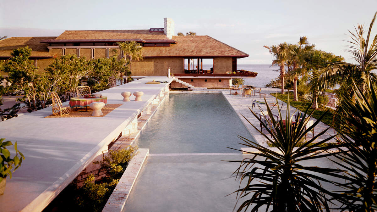 A view taken by famed architectural photographer Ezra Stoller of Miami architect Alfred Browning Parker’s waterfront 1963 home in Coral Gables shortly after it was built shows the elevated pool deck with the main house behind it.