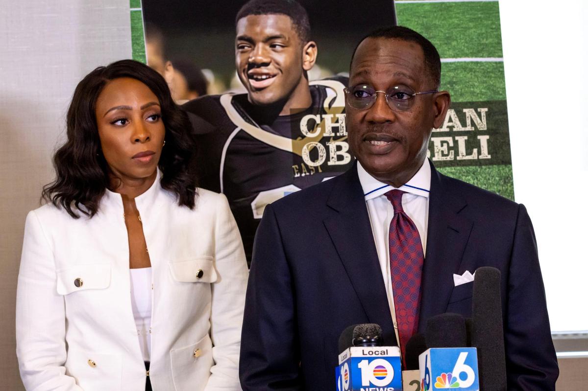 Lawyer Larry Handfield, right, speaks to the media as Karen Egbuna, cousin of Christian “Tobi” Obumseli, left, looks on during a press conference at Haggard Law Firm in Coral Gables, Florida, on Tuesday, May 9, 2023. The press conference was held after Tuesday morning’s criminal court hearing of admitted killer Courtney Clenney as Christian Obumseli’s family discussed the case publicly for the first time.