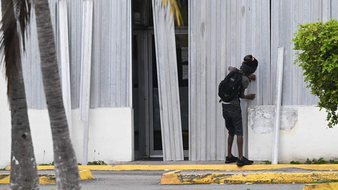 A man installs storm shutters at a business in preparation for the arrival of Hurricane Melissa in Portmore, St. Catherine parish, Jamaica, on October 25, 2025. Deadly storm Melissa strengthened Saturday afternoon into a Category 1 hurricane, with rapid intensification expected over the weekend as it cut a worryingly slow course toward the Caribbean island of Jamaica, forecasters said. (Photo by Ricardo Makyn / AFP) (Photo by RICARDO MAKYN/AFP via Getty Images) A man installs storm shutters at a business in preparation for the arrival of Hurricane Melissa in Portmore, St. Catherine parish, Jamaica, on October 25, 2025. Deadly storm Melissa strengthened Saturday afternoon into a Category 1 hurricane, with rapid intensification expected over the weekend as it cut a worryingly slow course toward the Caribbean island of Jamaica, forecasters said. (Photo by Ricardo Makyn / AFP) (Photo by RICARDO MAKYN/AFP via Getty Images)