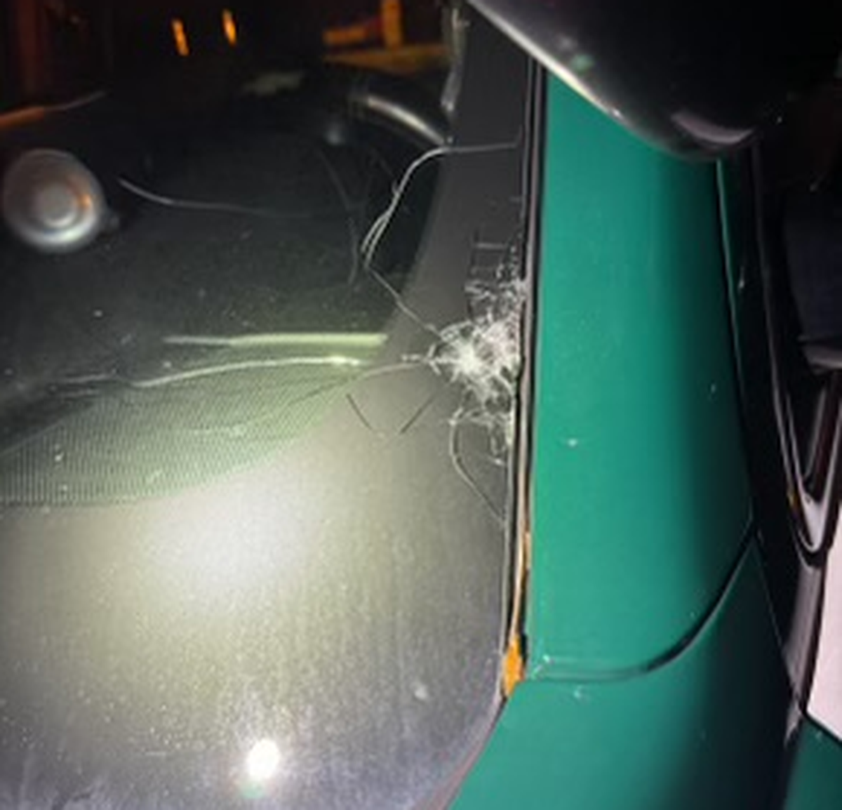 A bullet hole is shown impacting the windshield of a Broward Sheriff’s Office patrol car Wednesday, Aug. 7, 2024.