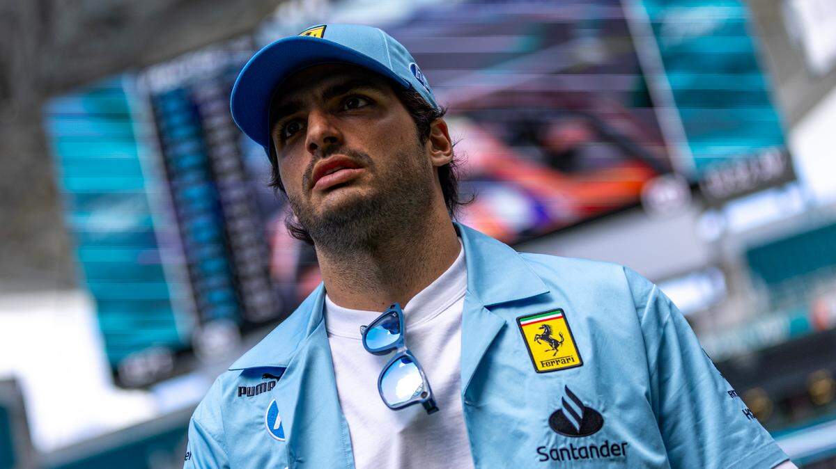 Scuderia Ferrari driver Carlos Sainz Jr. of Spain walks into Team Village during the Formula One Miami Grand Prix at the Miami International Autodrome on Friday, May 3, 2024, in Miami Gardens, Fla.