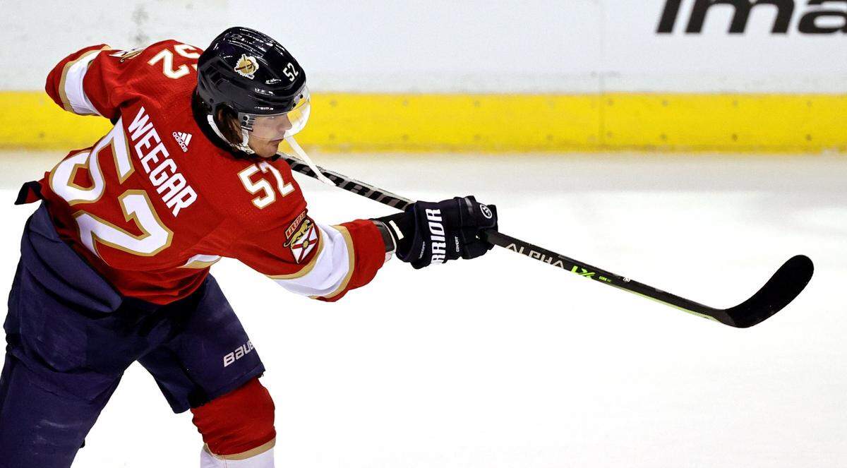 Florida Panthers defenseman MacKenzie Weegar (52) during warmups before the start of game against the Nashville Predators two of their doubleheader preseason NHL hockey game at FLA Live Arena on Sunday, September 26, 2021 in Sunrise, Florida.