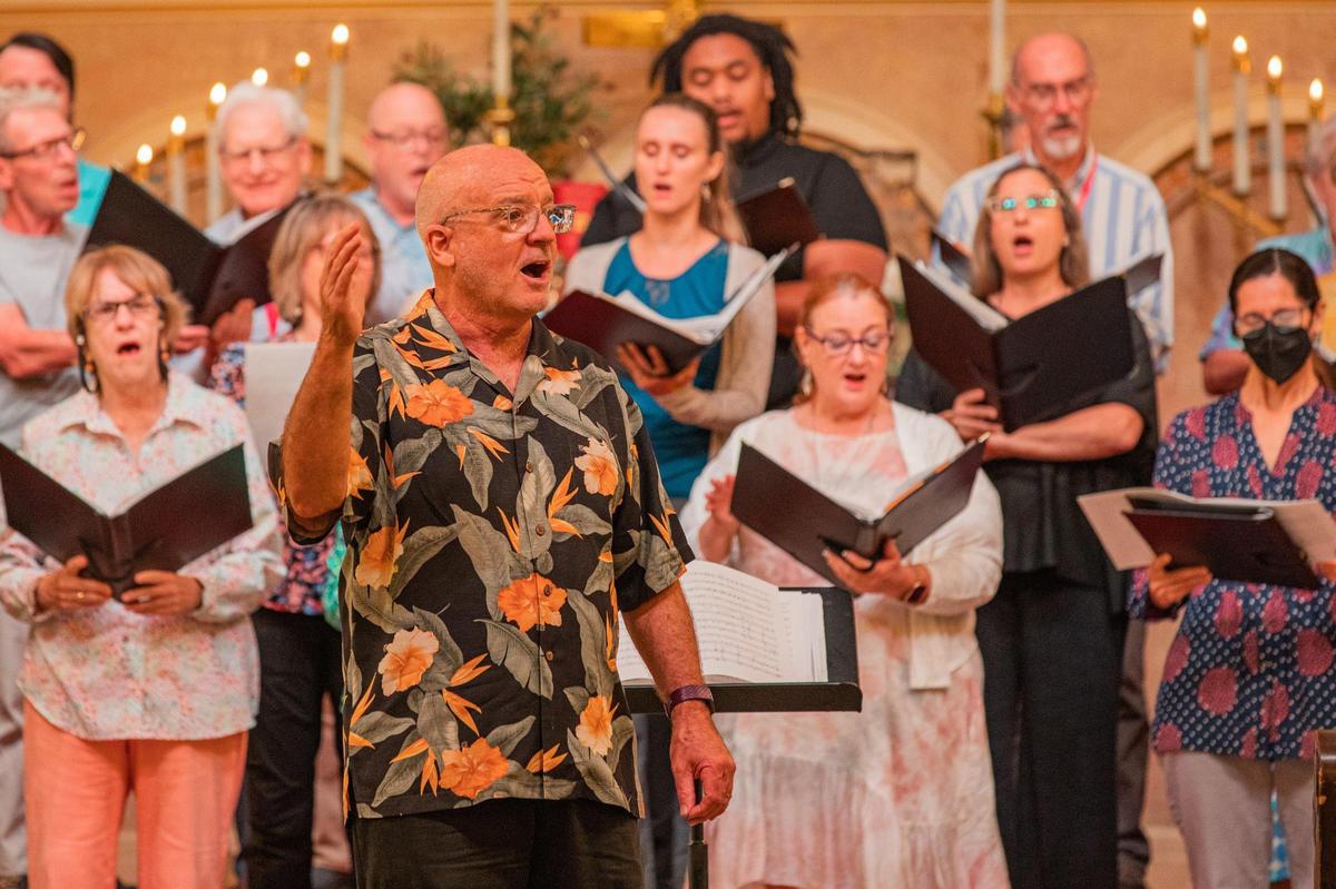 The choir sings during “An Interfaith Service of Remembrance, Hope, and Peace” on the 21st anniversary of 9/11 at Coral Gables Congregational United Church of Christ in Coral Gables, Fla. on Sept. 11, 2022.