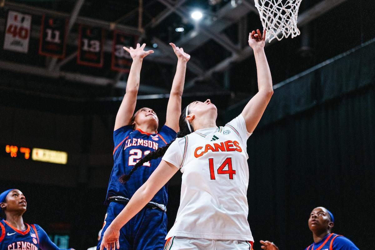University of Miami guard Gal Raviv and Clemson guard Hadley Periman battle in the paint during Clemson’s 70-55 victory at the Watsco Center on Jan. 4, 2026.