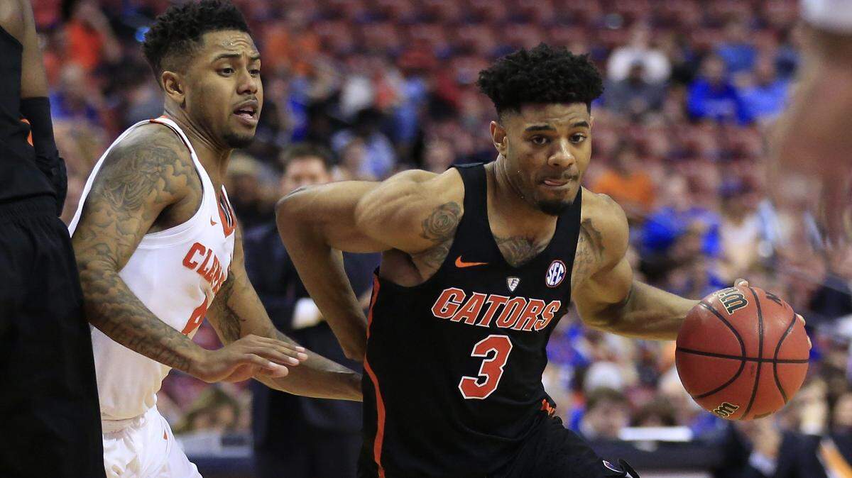 Florida's Jalen Hudson (3) drives the ball as the Florida Gators play the Clemson Tigers during the Orange Bowl Basketball Classic at the BB&T Center in Sunrise on December 16, 2017.