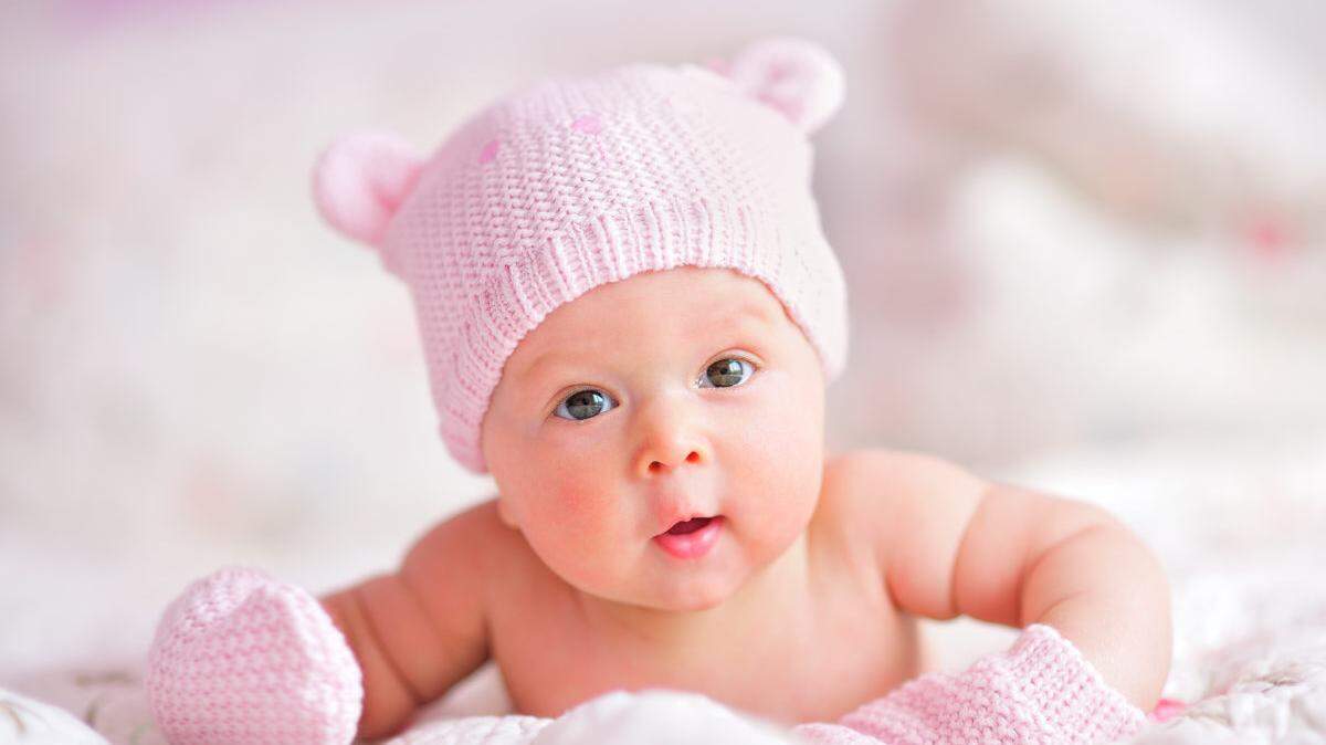 Newborn baby in pink