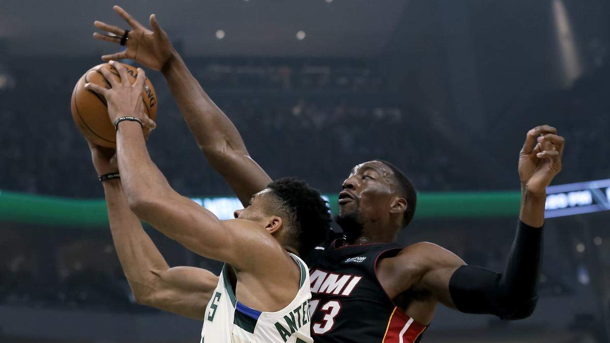 Giannis Antetokounmpo of the Milwaukee Bucks attempts a shot while being guarded by the Heat’s Bam Adebayo in a game last October. Antetokounmpo stands to become an unrestricted free agent in 2021. Adebayo can become a restricted free agent that summer.