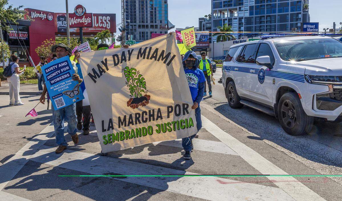 Hundreds of demonstrators participated in the WeCount "March for Planting Justice" to call attention to labor abuses in Florida’s plant nursery industry. 