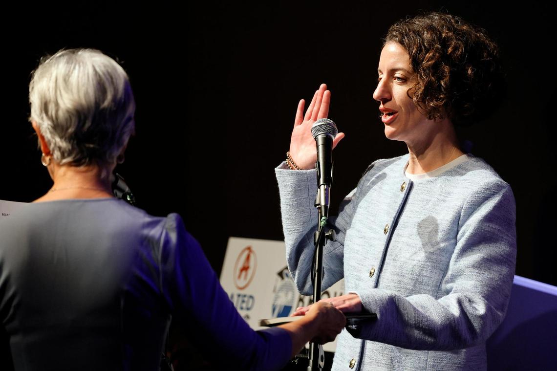 Newly elected Broward County School Board member Maura McCarthy Bulman (District 1) is sworn in by Hollywood City Commissioner Caryl Shaham at Dillard High School in Fort Lauderdale on Tuesday, Nov. 19, 2024. (Amy Beth Bennett / South Florida Sun Sentinel)