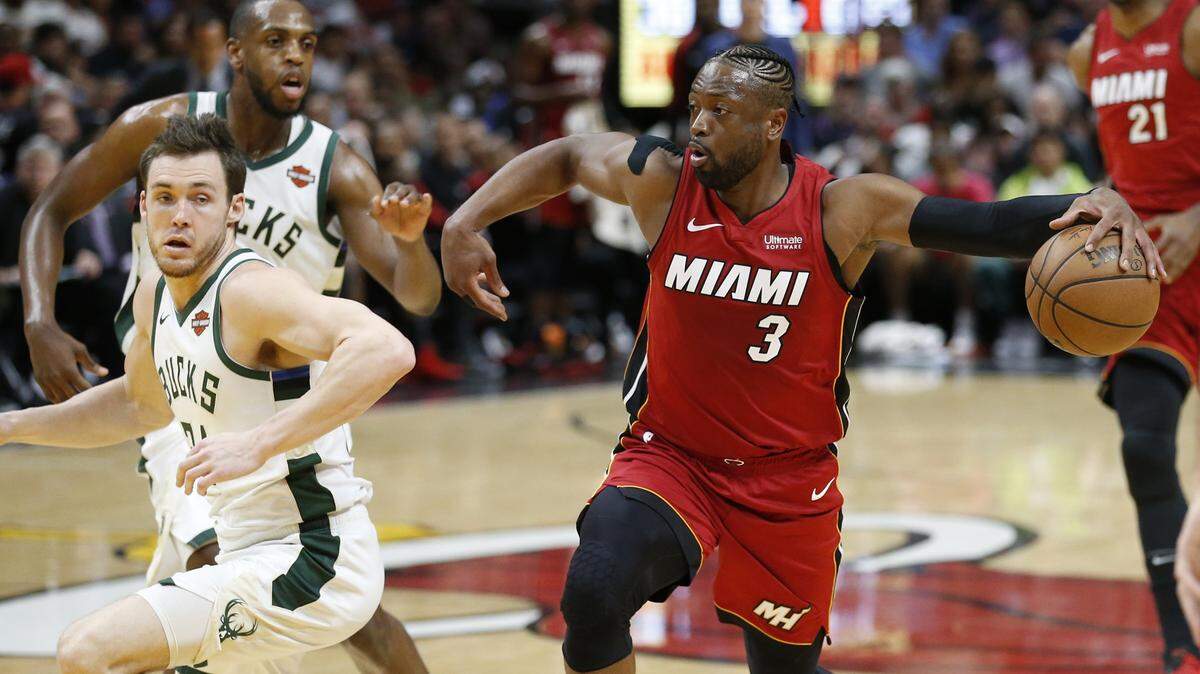 Miami Heat guard Dwyane Wade (3) drives towards the basket as Milwaukee Bucks guard Pat Connaughton (24) defends in the first quarter as the Miami Heat host the Milwaukee Bucks at the AmericanAirlines Arena on Friday, March 15, 2019.