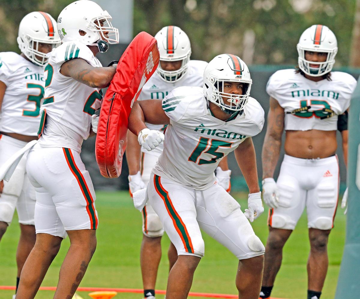Miami Hurricanes defensive lineman Gregory Rousseau (15) runs through practice drills at the University of Miami’s Greentree Field in Coral Gables on Friday, March 6, 2020.