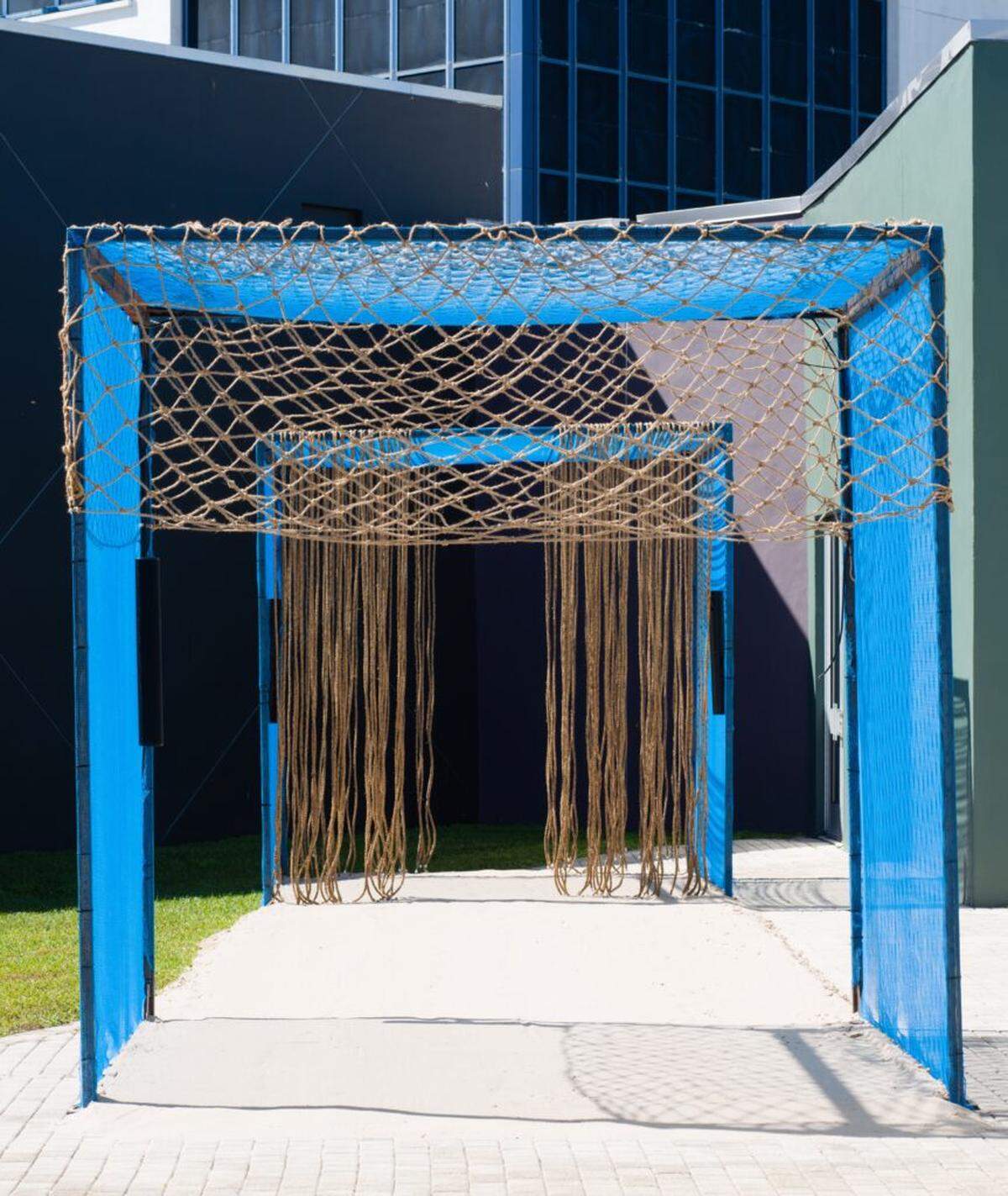 The two “rooms” reference the states of enslavement and freedom, while the soundscape of the ocean is a unifying element.