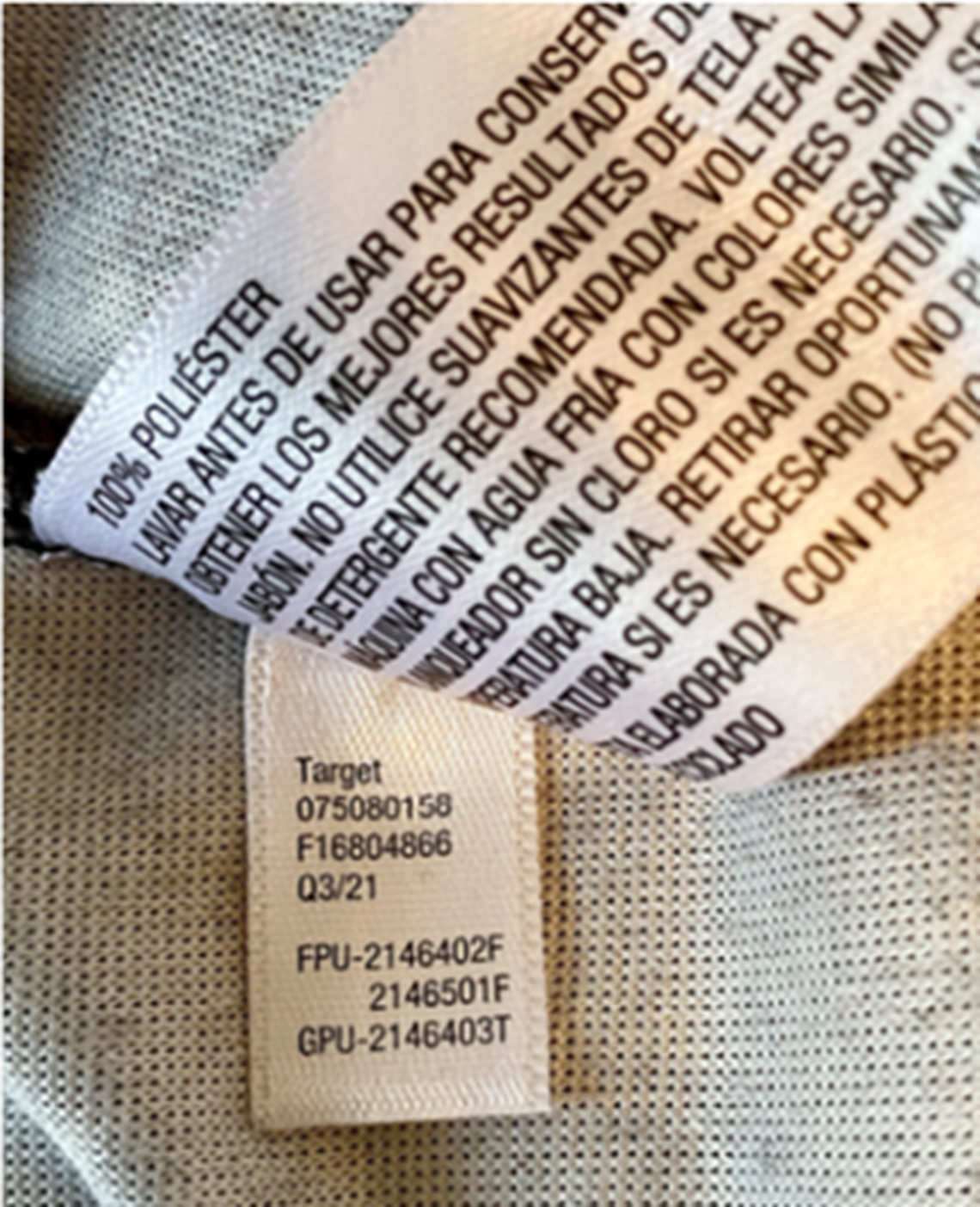 The pajama set item number is on this white tag inside the top and the bottom.