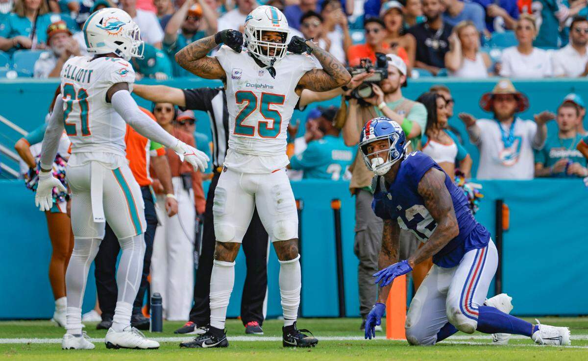 Miami Dolphins cornerback Xavien Howard (25) reacts after blocking a pass to New York Giants tight end Darren Waller (12) at Hard Rock Stadium in Miami Gardens on Sunday, October 8, 2023.