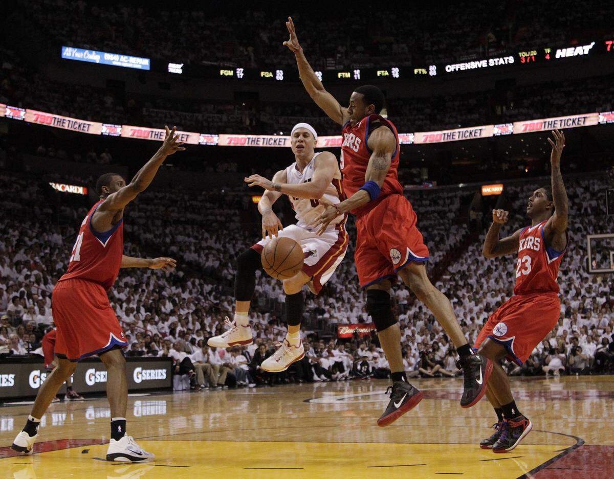 The Heat’s Mike Bibby passes to LeBron James in the second half during the Miami Heat vs the Philadelphia 76ers at the AmericanAirlines Arena for the first round, game two of the NBA Playoffs on Monday, March 18, 2011.